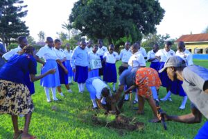 St. John’s Secondary School, Nandere, HeadTeacher Mr. Muhimbise Potez, encourages students to realize their potential during the Laudato Si Club Opening Ceremony
